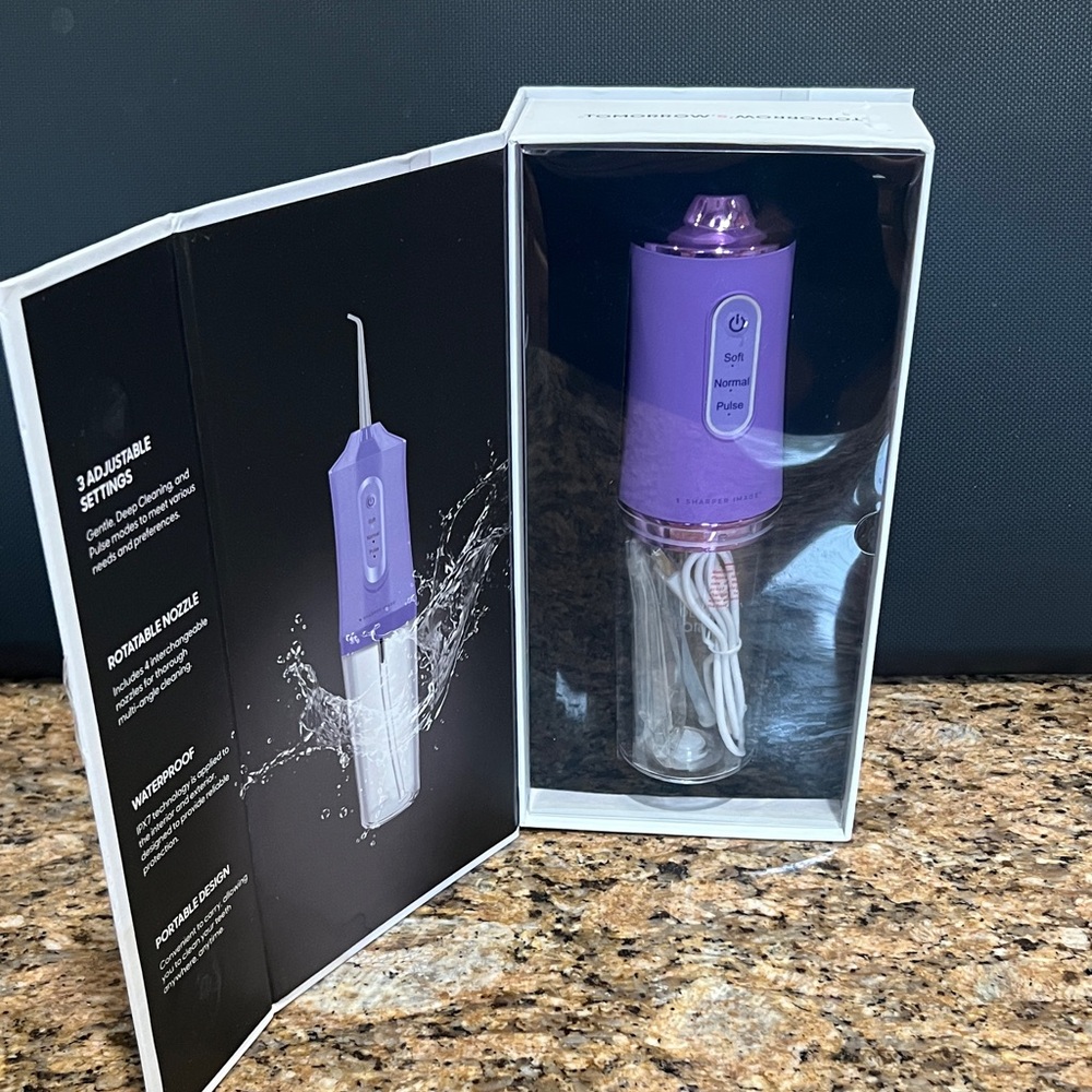 Brand new packaged Purple Cordless Water Flosser